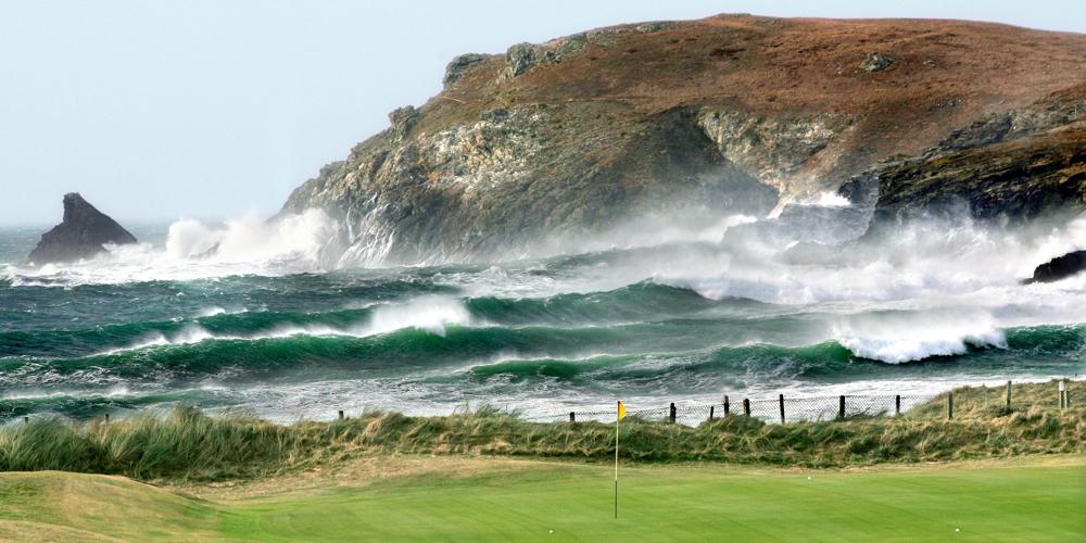 The 4th green at Trevose, with the Atlantic Ocean and Trevose Head in the background.