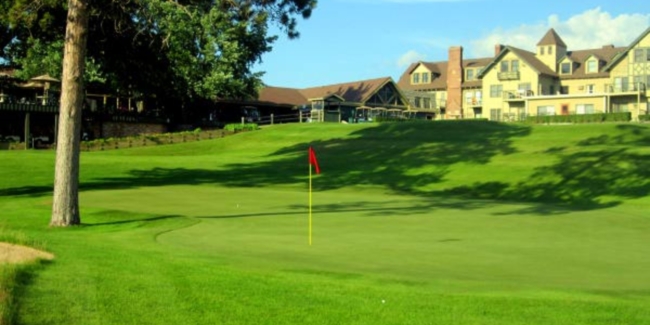 Hole eighteen looking up at the Madden Inn and Golf Club