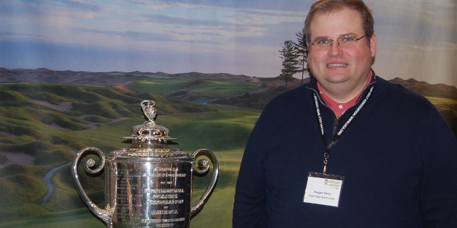 Reagan Davis Poses With The PGA Wanamaker Trophy